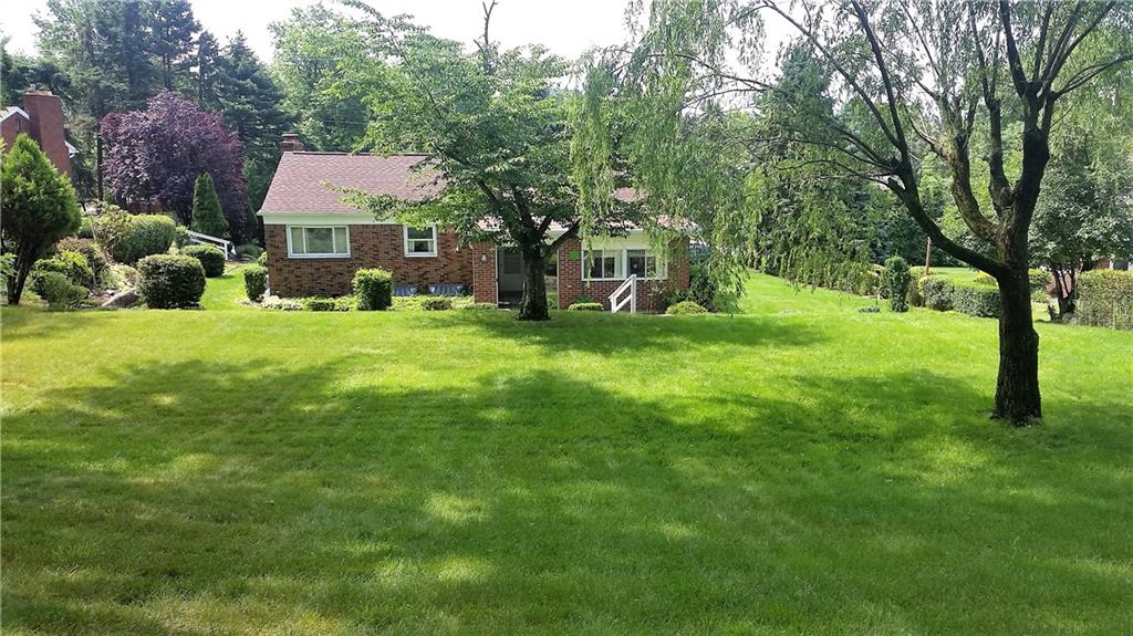 132 Siebert Road Pittsburgh, PA 15237 - Photo 9 of 23 Back of home showing large, lush yard.