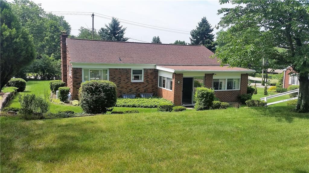 132 Siebert Road Pittsburgh, PA 15237 - Photo 10 of 23 Back of home showing the 3 season room.