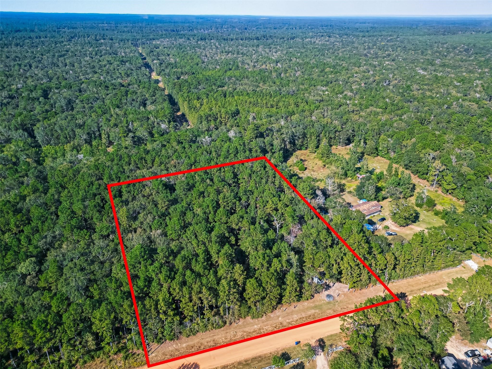 0 Oak Rdg Street Cleveland, TX 77328 - Photo 5 of 11 a view of a lush green field