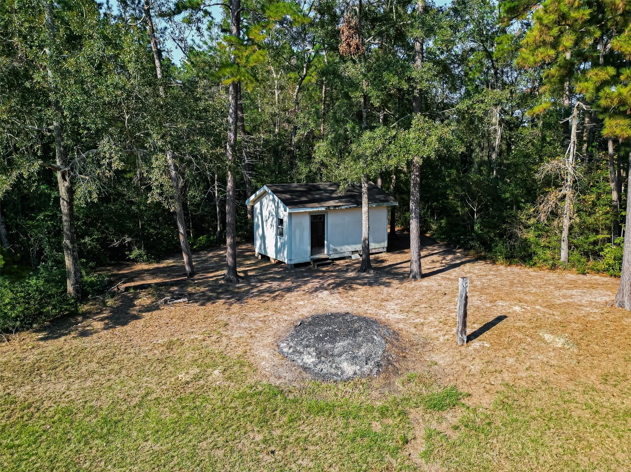 0 Oak Rdg Street Cleveland, TX 77328 - Photo 7 of 11 a view of a house with backyard and sitting area