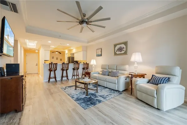 a view of a dining room with furniture and window