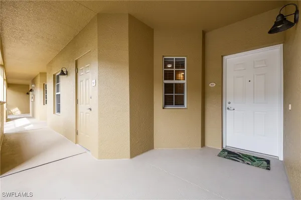 a kitchen with a stove and a microwave
