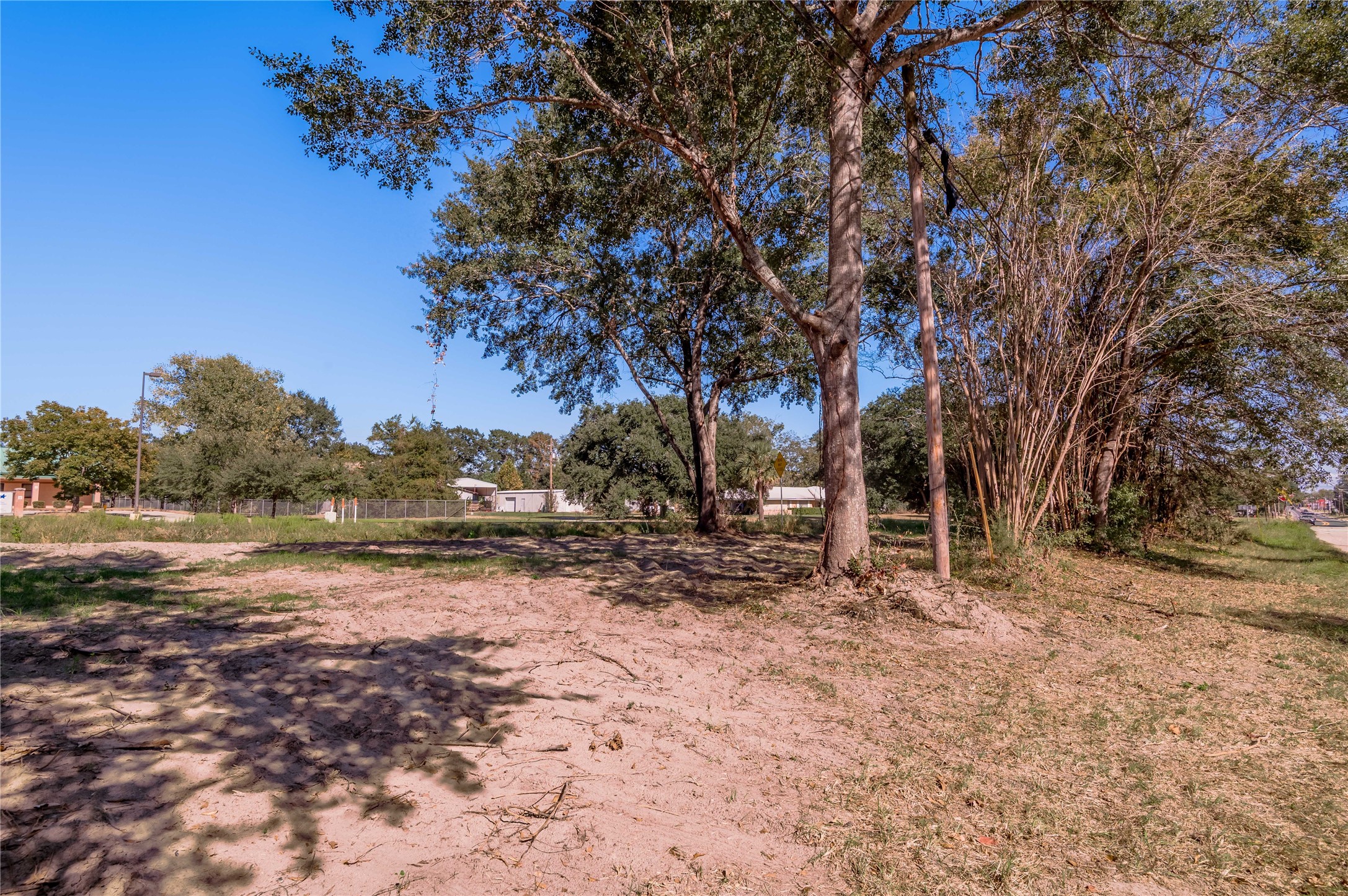 805 East 1st Street Groveton, TX 75845 - Photo 2 of 10 a backyard of a house with lots of green space