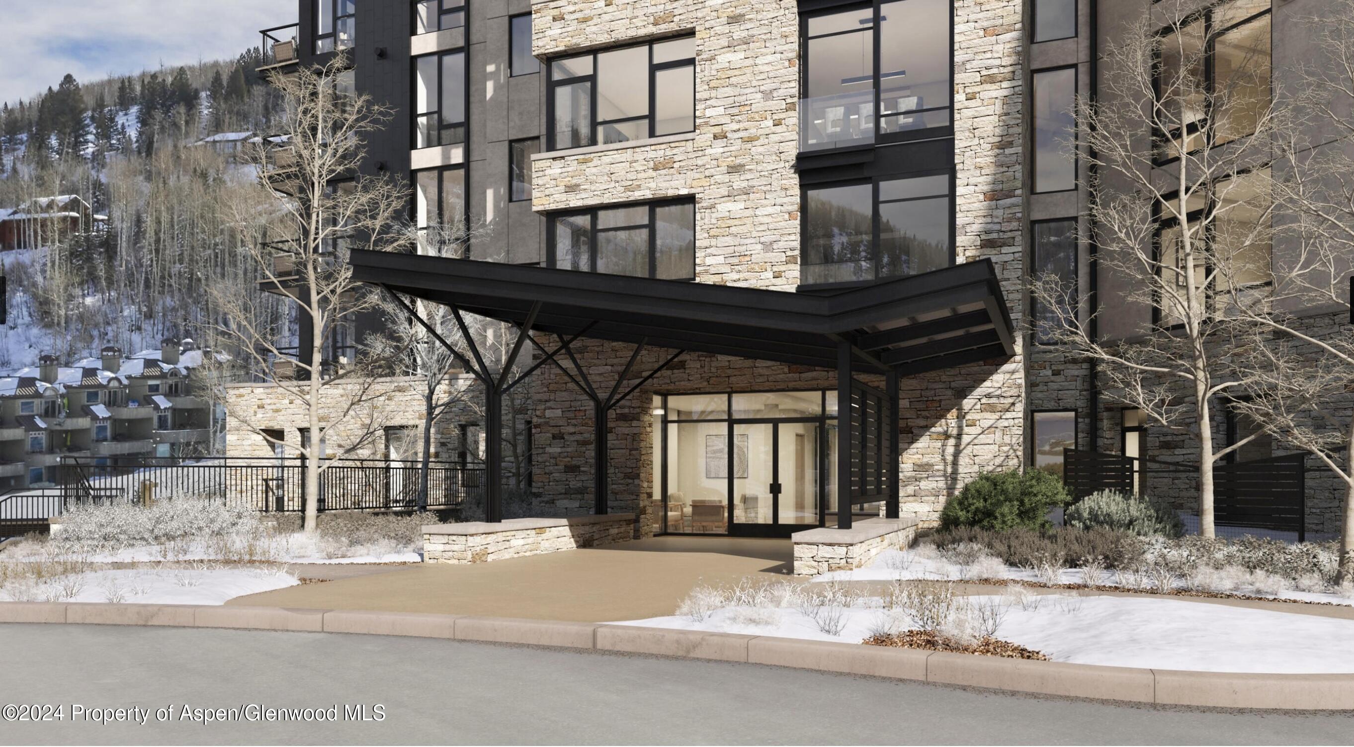 130 Wood Road, Unit 464 Snowmass Village, CO 81615 - Photo 18 of 19 a building that has a sign on it