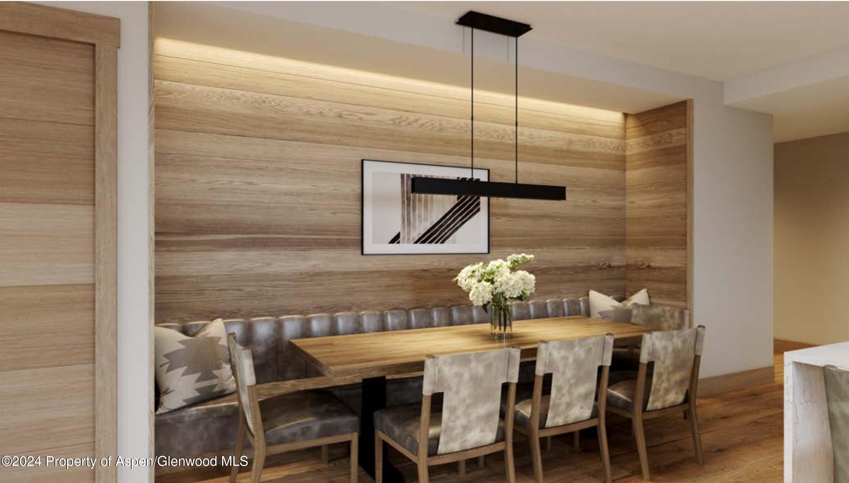 130 Wood Road, Unit 464 Snowmass Village, CO 81615 - Photo 8 of 19 a dining room with furniture and chandelier