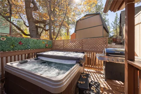 a view of a two chair and table in the balcony