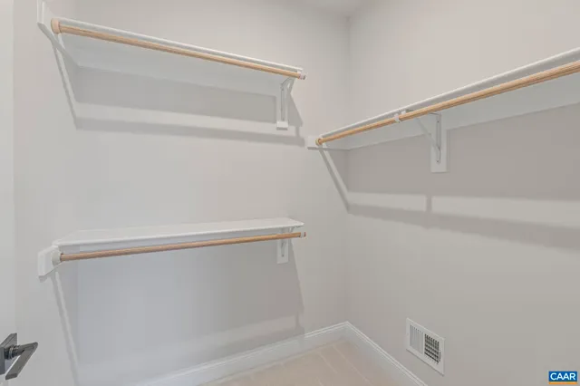 a bathroom with a shower and tub