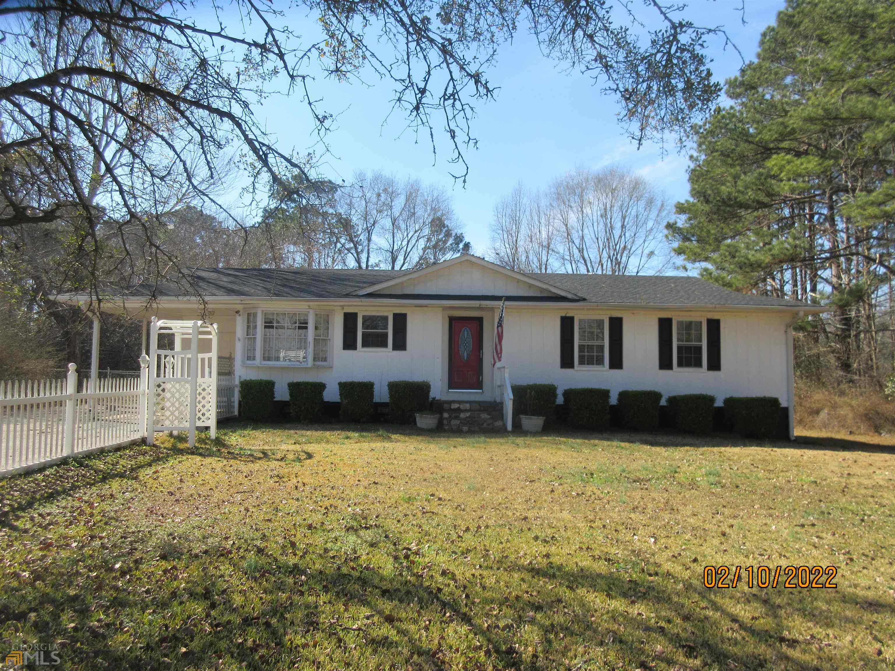 2804 Macon Road Griffin, GA 30224 - Photo 1 of 1 a front view of a house with yard and trees