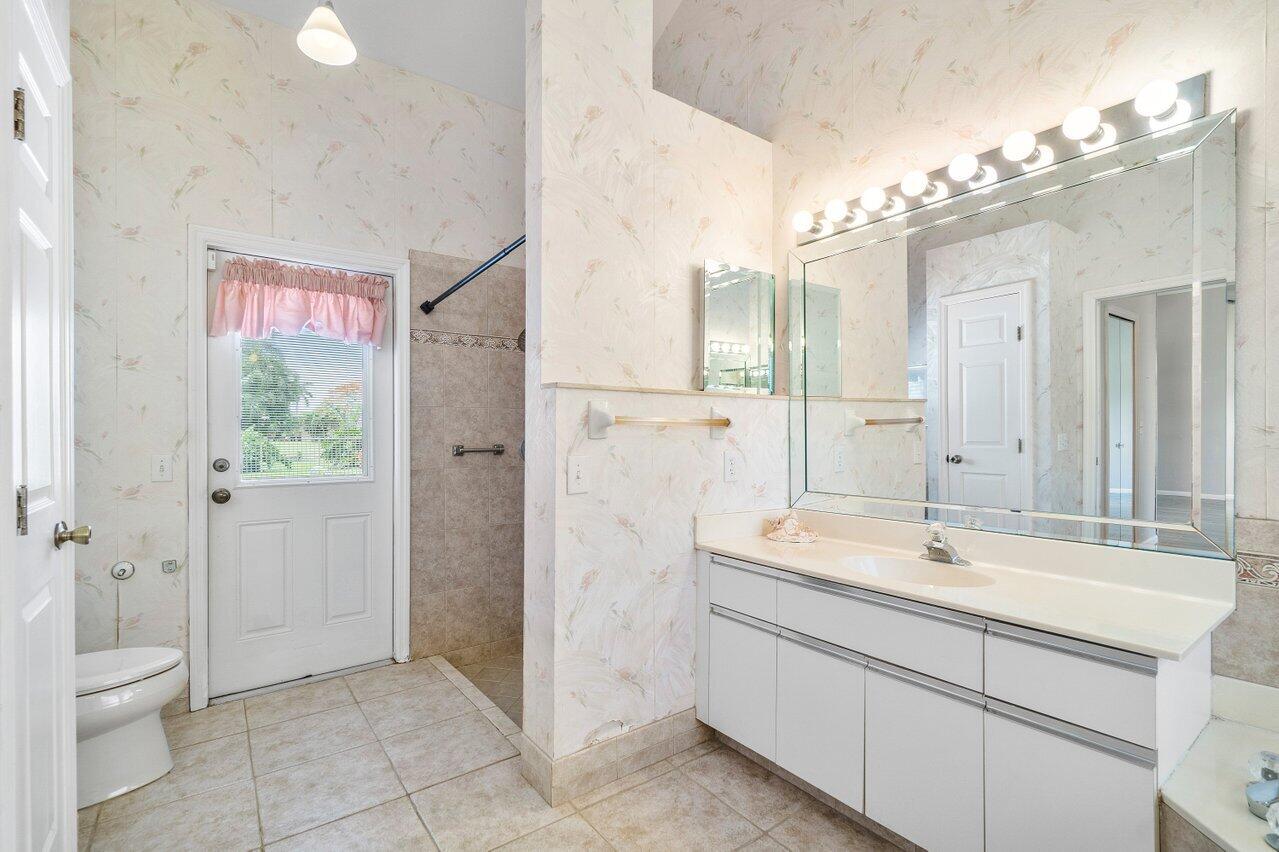 10792 Sea Cliff Circle Boca Raton, FL 33498 - Photo 23 of 44 Master Bath w/ Patio Access