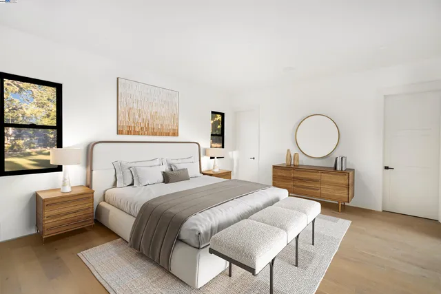 a bedroom with bed and a window