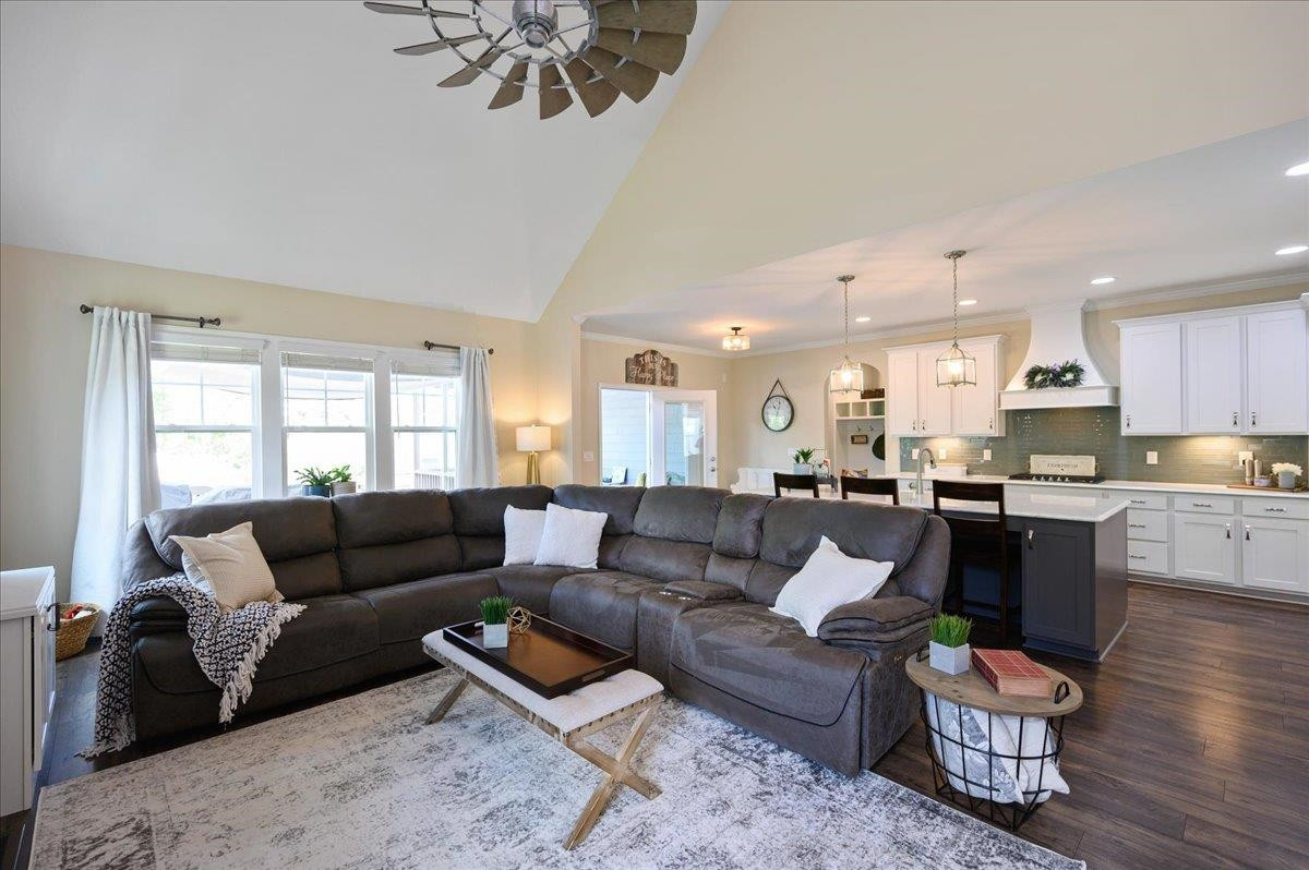7032 Rex Road Holly Springs, NC 27540 - Photo 38 of 38 Laminate floors, high ceilings, gourmet kitchen. Yes, please! Open floorplan