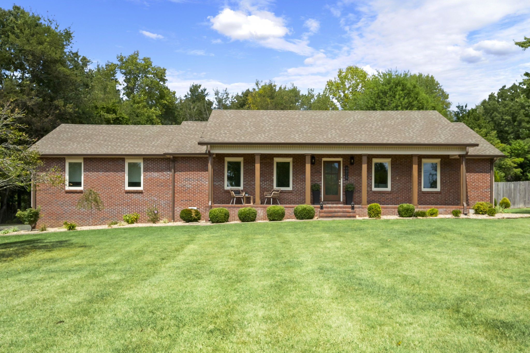 4926 Mt Zion Road Springfield, TN 37172 - Photo 1 of 48 a front view of a house with a garden