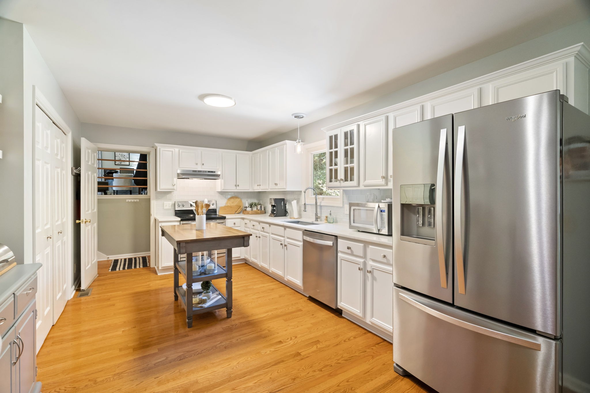 4926 Mt Zion Road Springfield, TN 37172 - Photo 23 of 48 a kitchen with stainless steel appliances a refrigerator stove microwave and cabinets