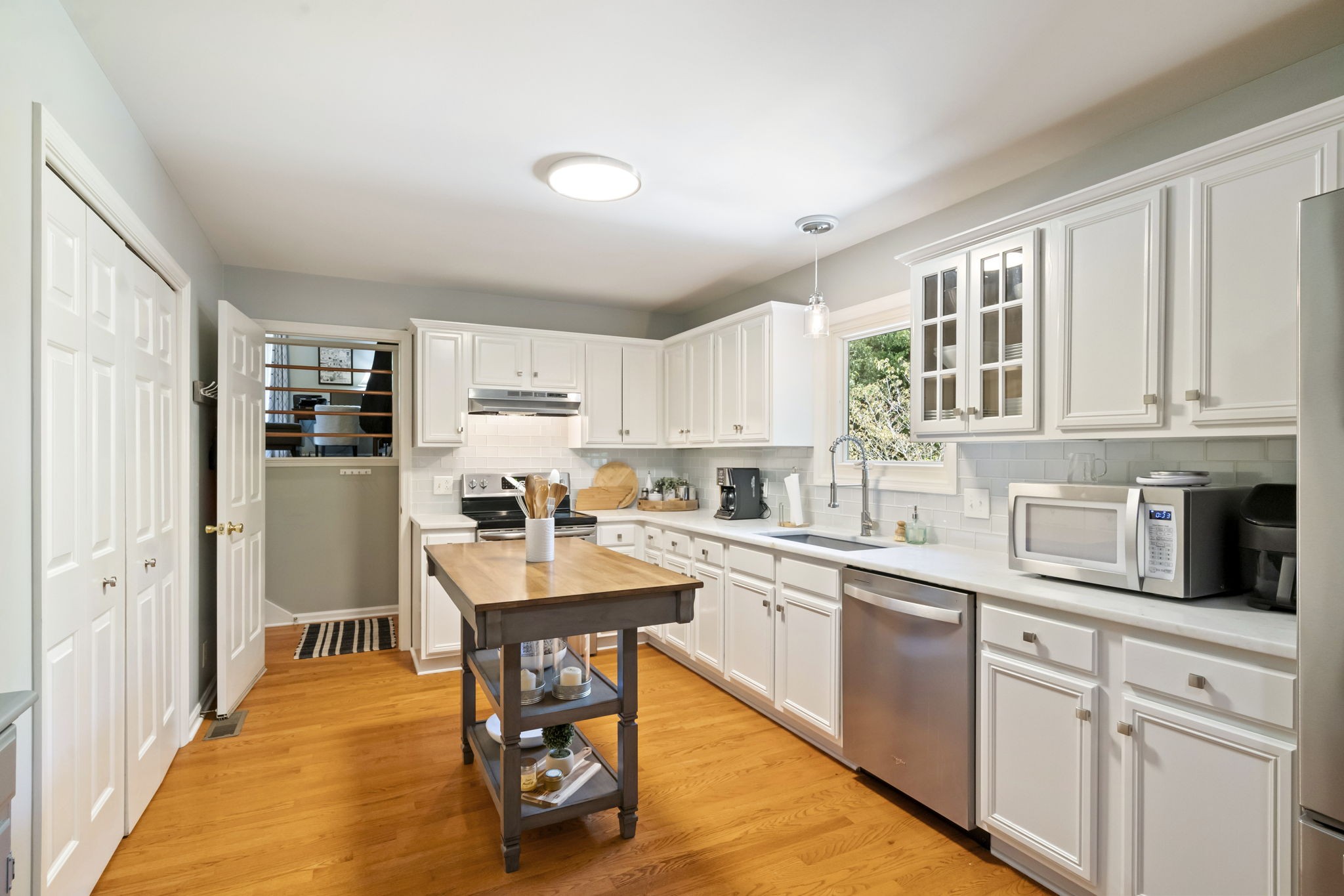 4926 Mt Zion Road Springfield, TN 37172 - Photo 24 of 48 a kitchen with stainless steel appliances granite countertop a refrigerator and a stove top oven