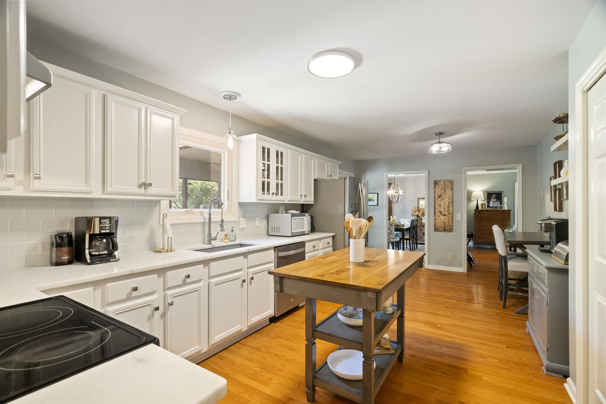 4926 Mt Zion Road Springfield, TN 37172 - Photo 27 of 48 a kitchen with stainless steel appliances granite countertop a sink counter space and cabinets