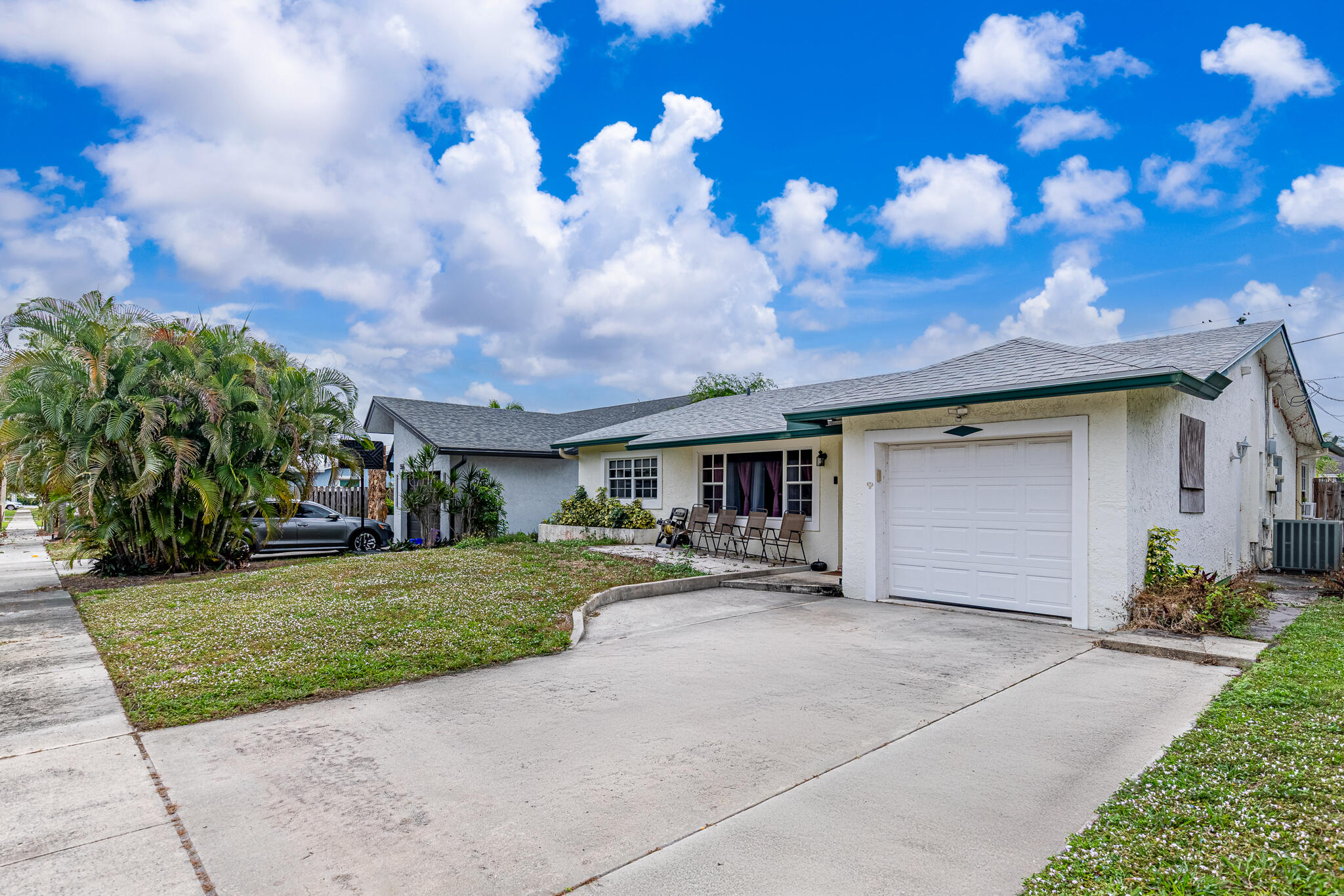 564 Northwest 55th Street Boca Raton, FL 33487 - Photo 3 of 26 Front Home-C