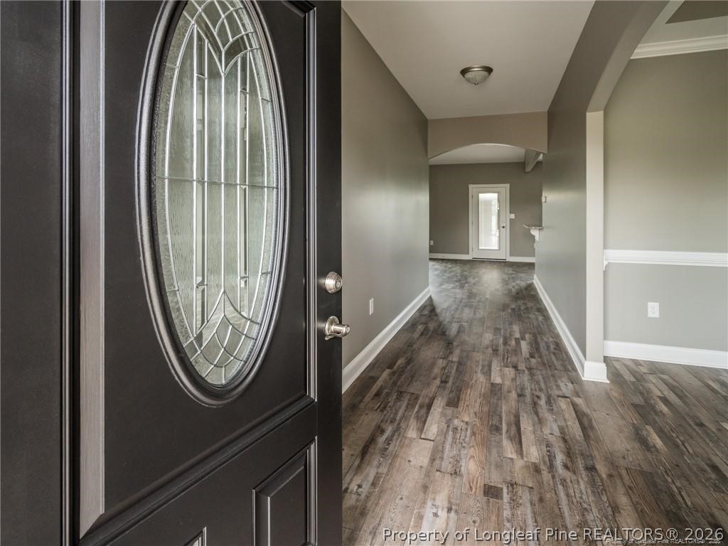 1102 West Carthage Road Lumberton, NC 28360 - Photo 5 of 41 a view of a livingroom with wooden floor and entrance