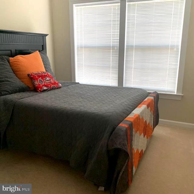 4097 River Forth Drive Fairfax, VA 22030 - Photo 12 of 18 a bedroom with a bed and window