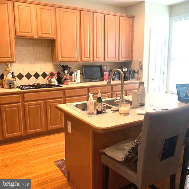 4097 River Forth Drive Fairfax, VA 22030 - Photo 2 of 18 a kitchen with a sink cabinets and a window