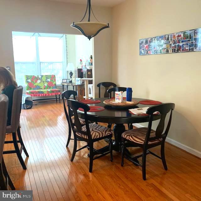 4097 River Forth Drive Fairfax, VA 22030 - Photo 6 of 18 a dining room with furniture and a window