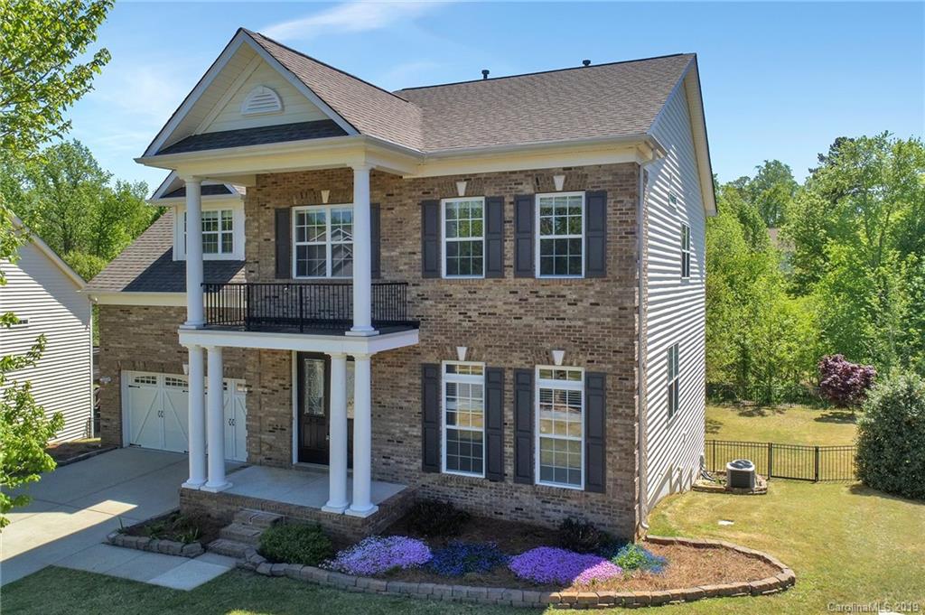 866 Treasure Court Fort Mill, SC 29708 - Photo 2 of 38 a front view of a house with a yard