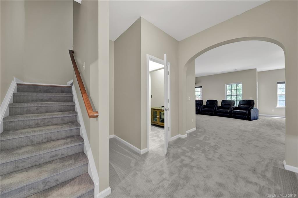 866 Treasure Court Fort Mill, SC 29708 - Photo 28 of 38 a view of a livingroom with furniture and staircase