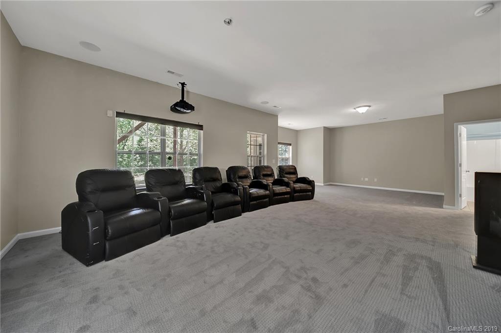 866 Treasure Court Fort Mill, SC 29708 - Photo 30 of 38 a living room with couches and painted walls