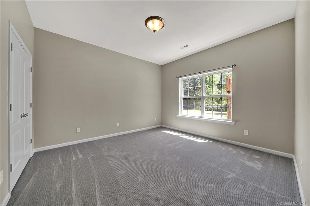 866 Treasure Court Fort Mill, SC 29708 - Photo 32 of 38 a view of an empty room with a window