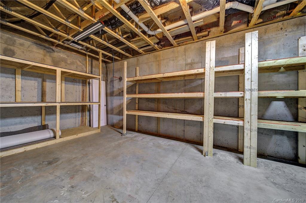 866 Treasure Court Fort Mill, SC 29708 - Photo 34 of 38 a view of an empty room with a cabinet
