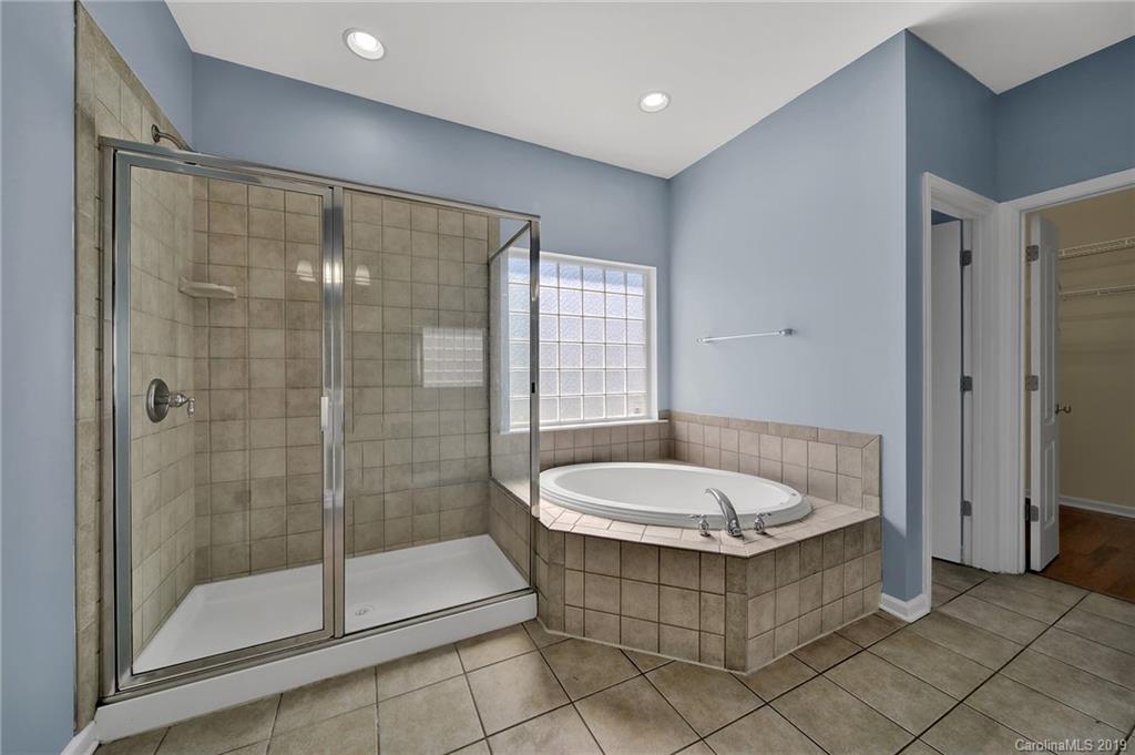 866 Treasure Court Fort Mill, SC 29708 - Photo 10 of 38 a bathroom with a shower and a sink