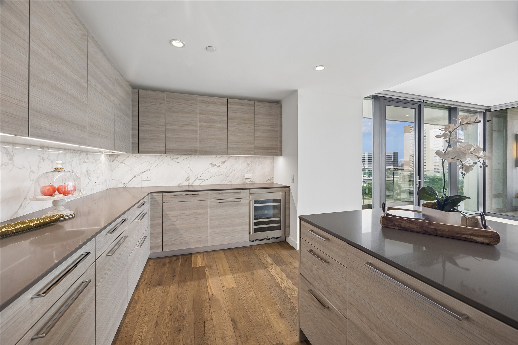 3433 Westheimer Road, Unit 702 Houston, TX 77027 - Photo 10 of 48 A dedicated beverage station with wine storage adds both convenience and sophistication for effortless entertaining.