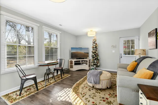 a kitchen with granite countertop cabinets stainless steel appliances and a sink