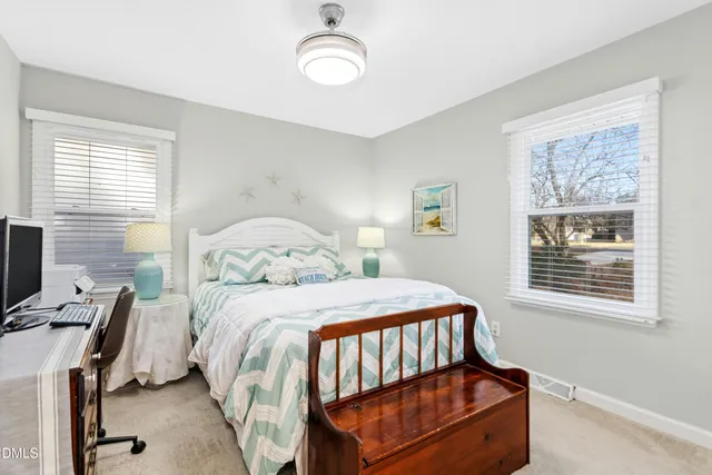 a bathroom with a sink mirror and a vanity