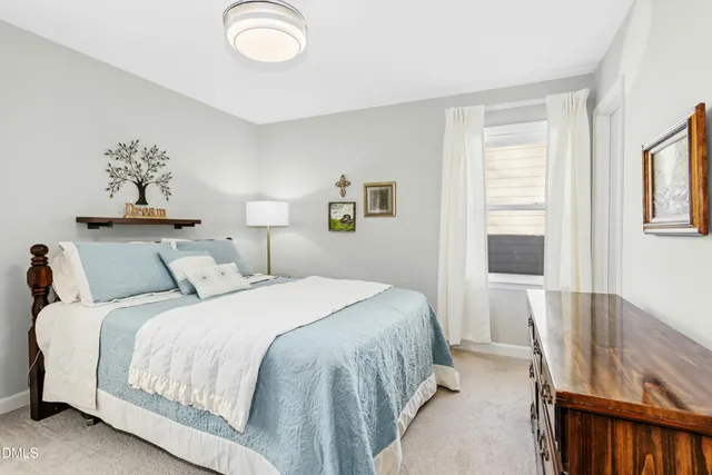 a bedroom with a bed and a closet