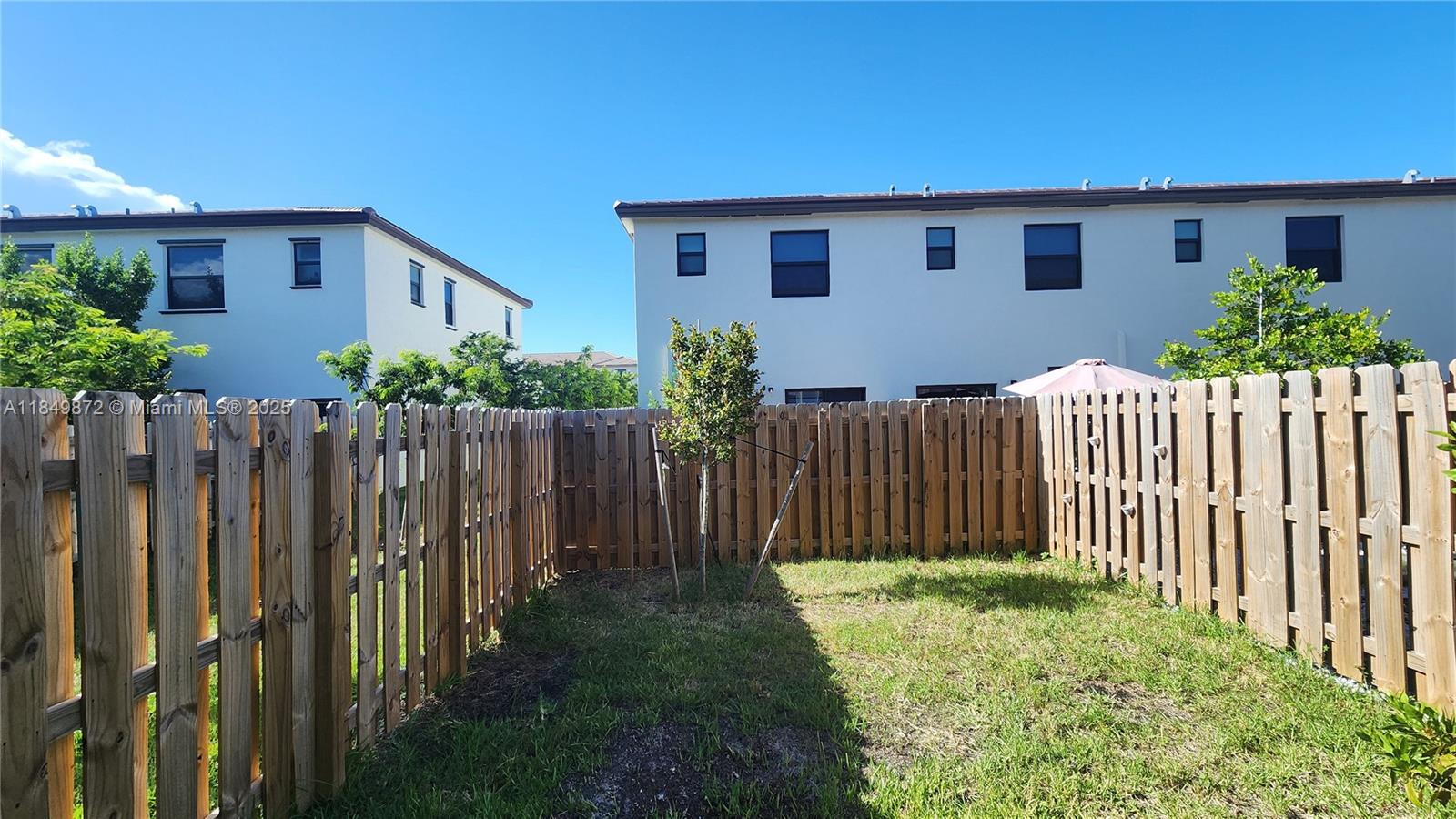 12897 Southwest 234th Street Homestead, FL 33032 - Photo 17 of 24 a front view of house with yard