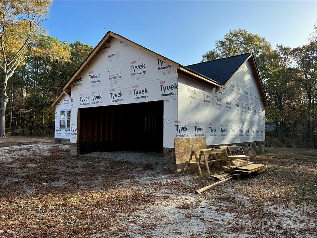 1091 Tryon Street Lancaster, SC 29720 - Photo 2 of 30 a front view of a house with a yard