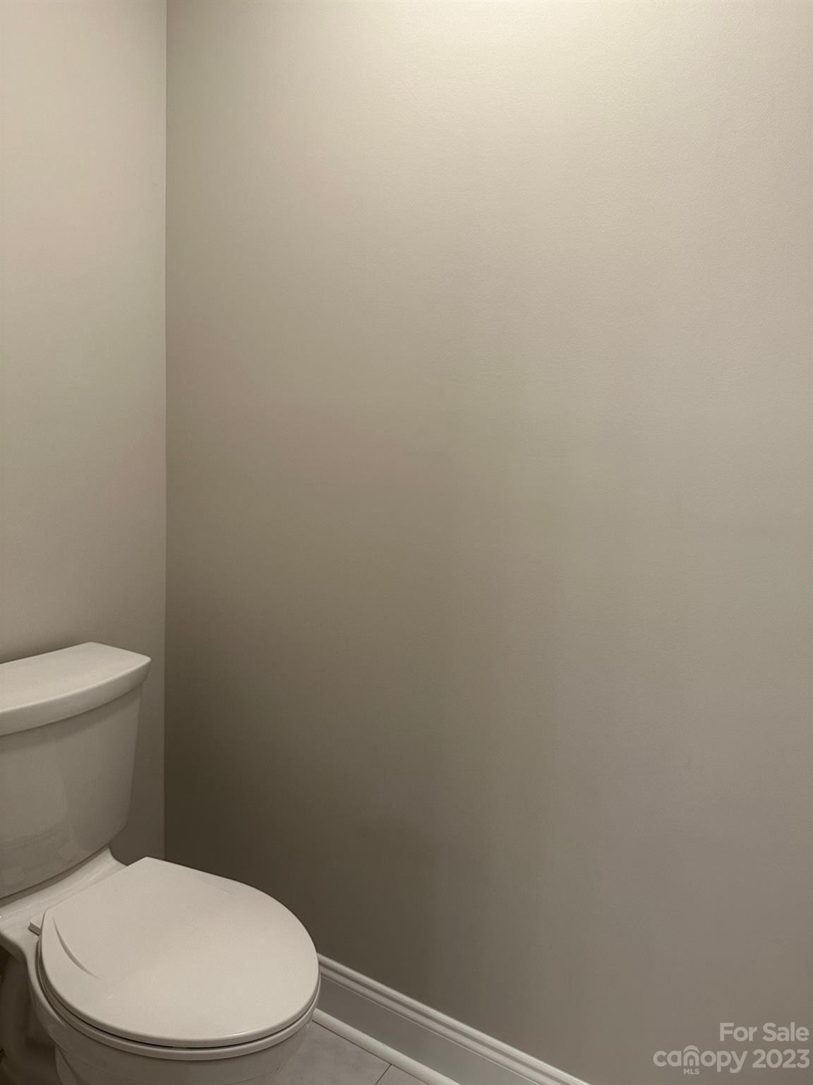 1091 Tryon Street Lancaster, SC 29720 - Photo 29 of 30 a white toilet sitting next to a white wall