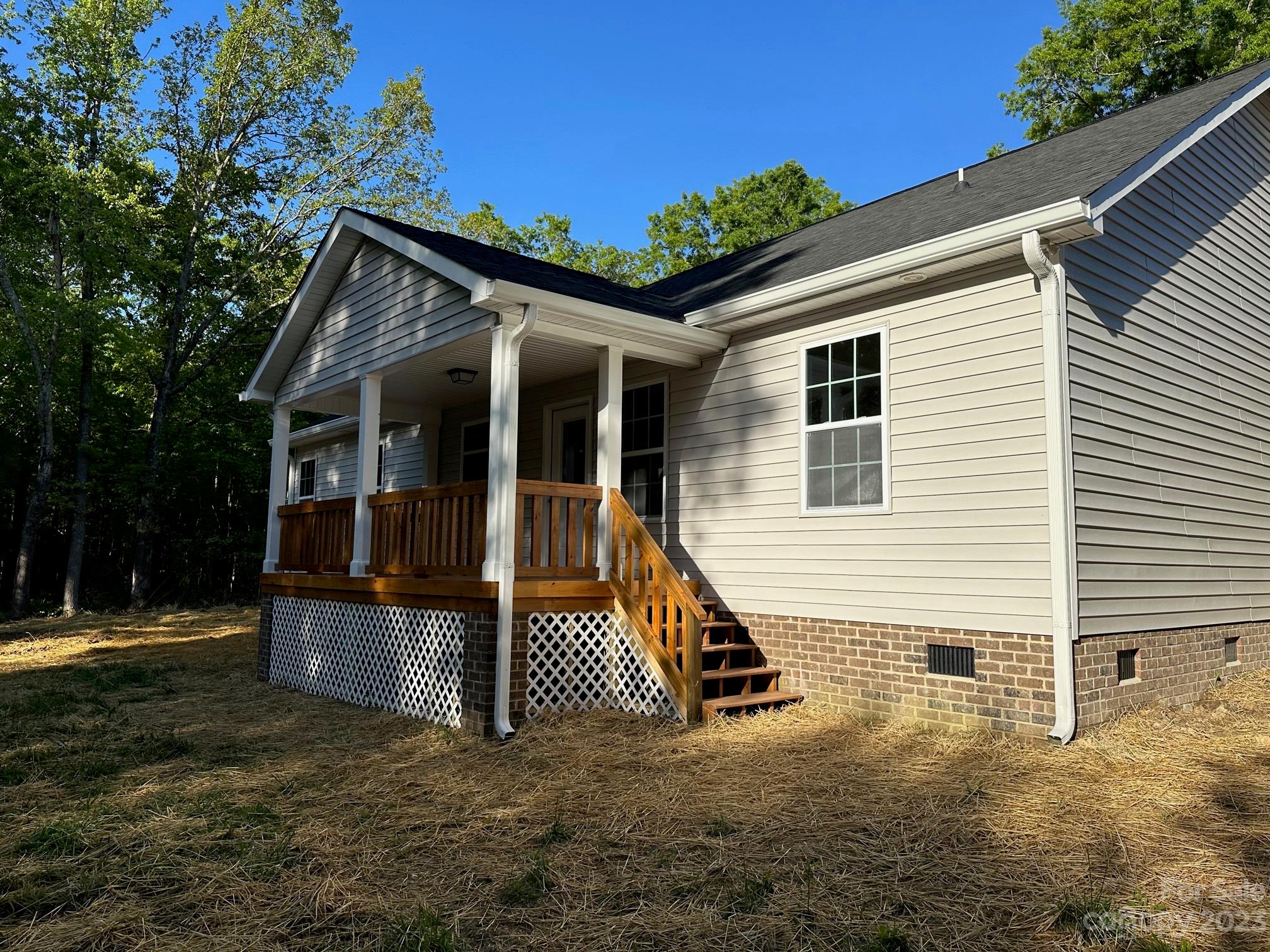 1091 Tryon Street Lancaster, SC 29720 - Photo 8 of 30 a view of a house with backyard and porch