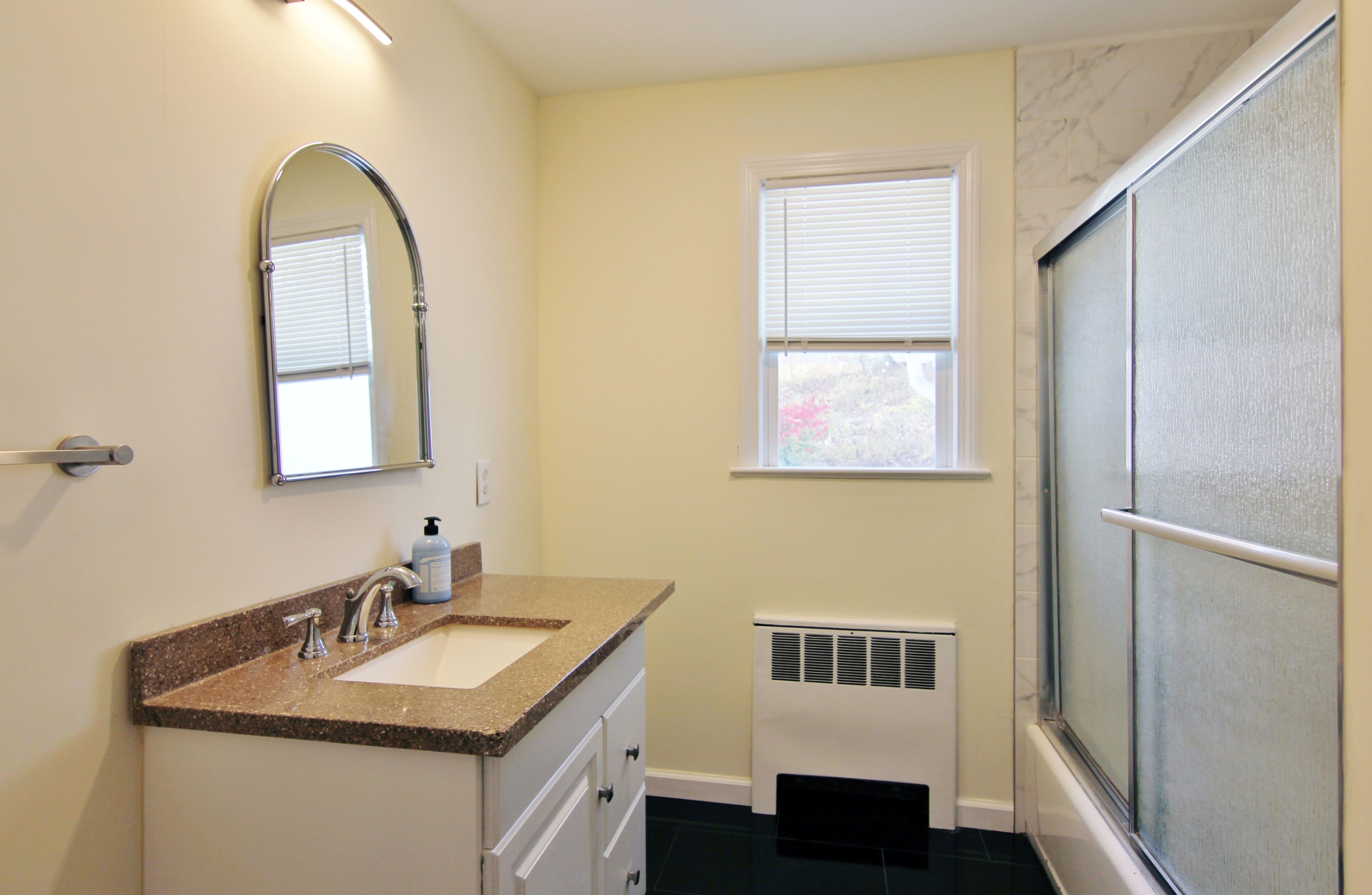 663 High Ridge Road Stamford, CT 06905 - Photo 15 of 27 a bathroom with a sink and a mirror