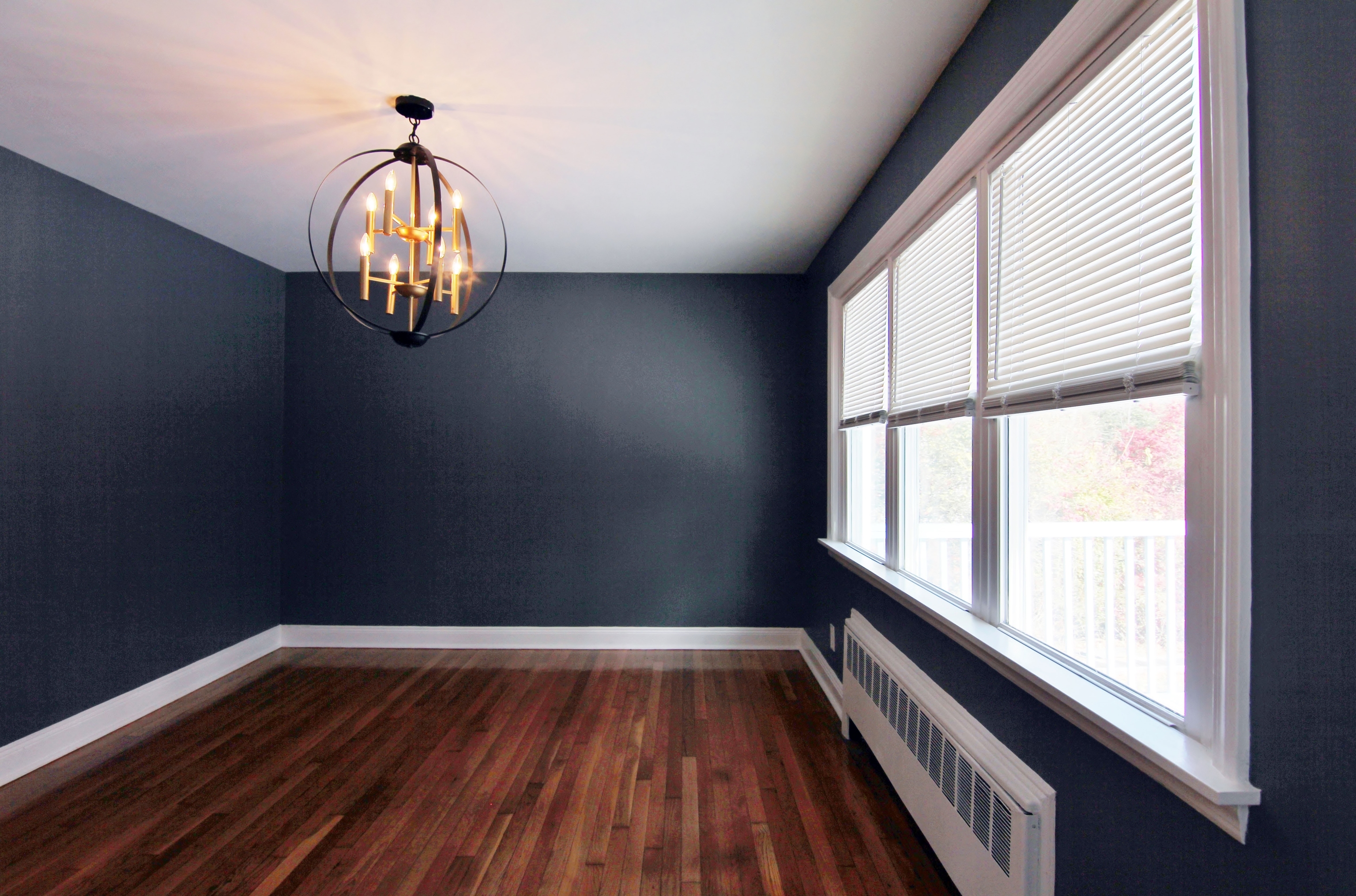 663 High Ridge Road Stamford, CT 06905 - Photo 8 of 27 a view of empty room with wooden floor and fan