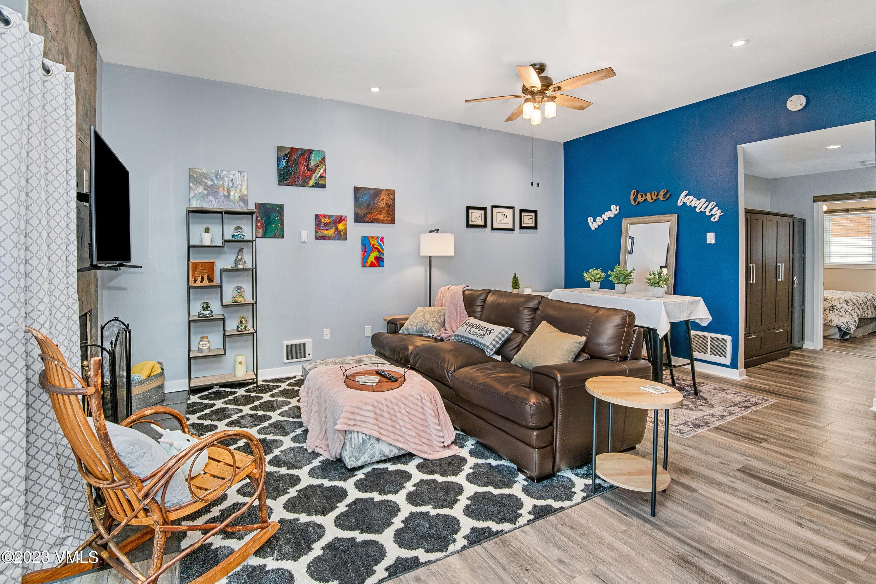 280 Gopher Road, Unit E29 Eagle-Vail, CO 81620 - Photo 14 of 22 a living room with furniture and a flat screen tv