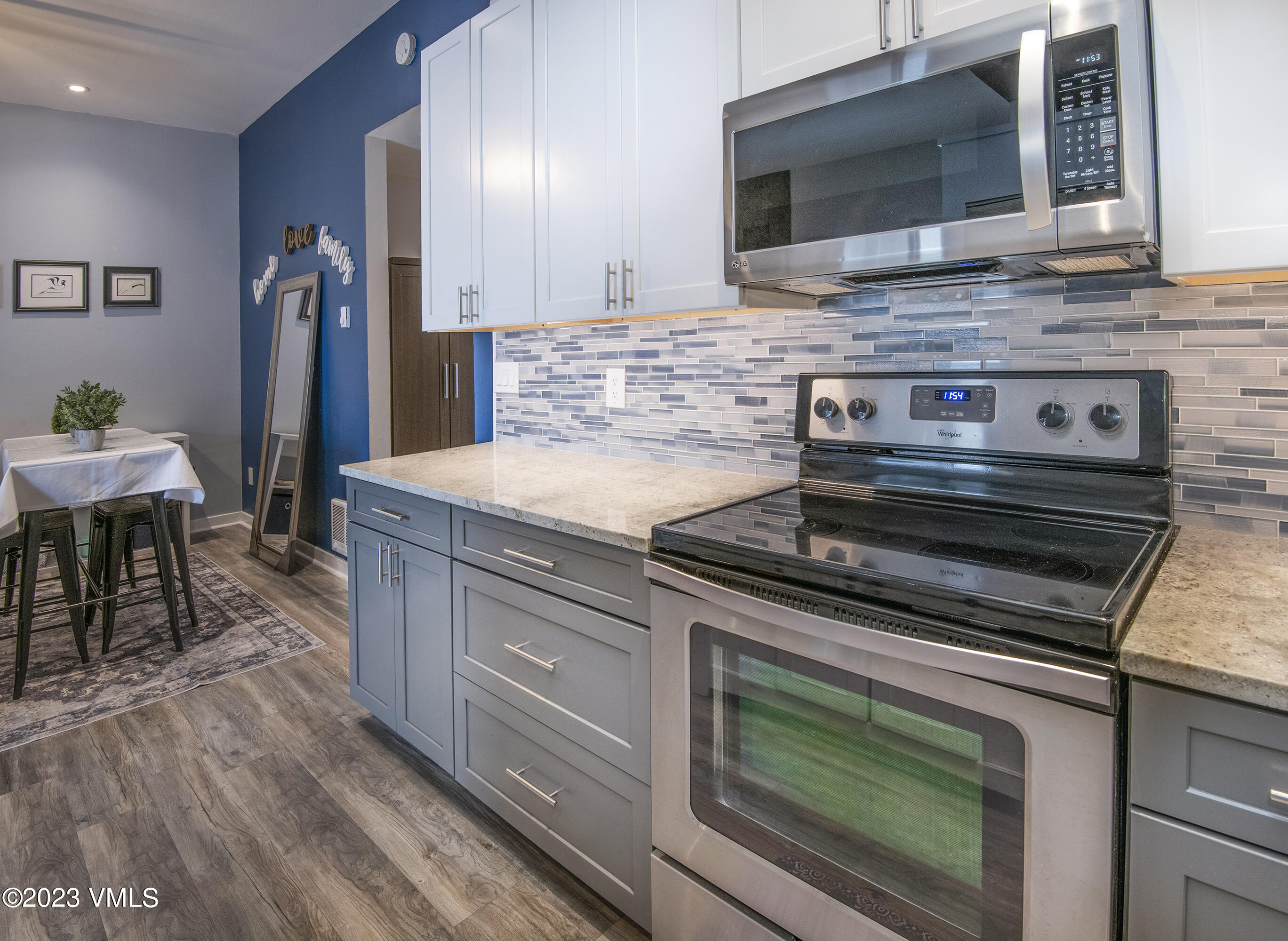 280 Gopher Road, Unit E29 Eagle-Vail, CO 81620 - Photo 18 of 22 a kitchen with a stove and a microwave