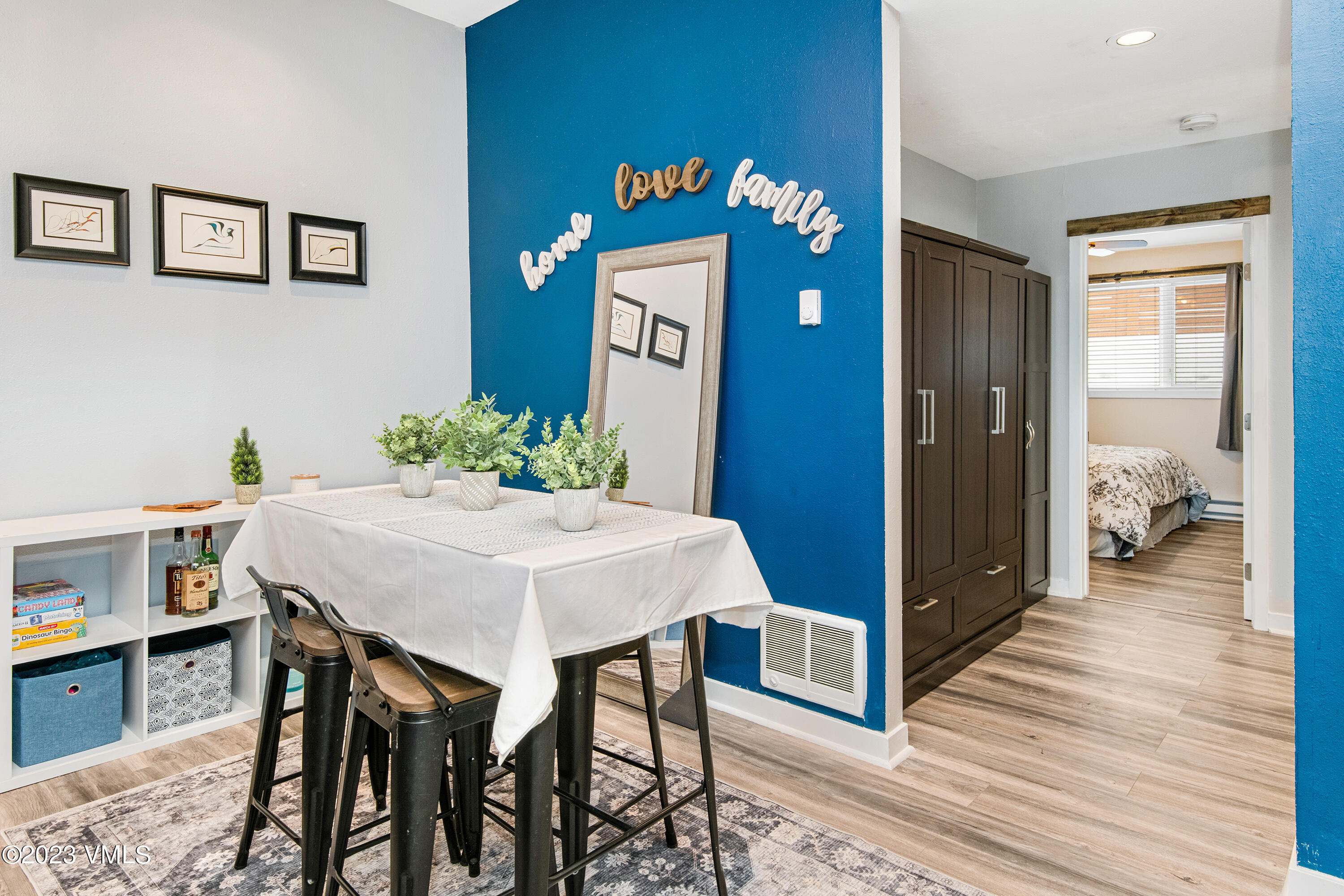 280 Gopher Road, Unit E29 Eagle-Vail, CO 81620 - Photo 3 of 22 a view of a dining room with furniture and wooden floor