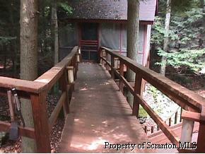 3139 Northgate Road Lake Ariel, PA 18436 - Photo 6 of 8 a view of balcony with wooden floor and fence