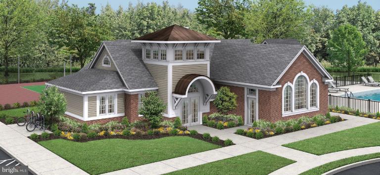 2653 Shade Branch Road, Unit 47 Hanover, MD 21076 - Photo 1 of 6 a front view of a house with garden