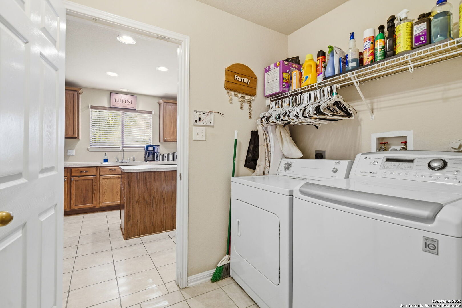 133 Falling Sun Cibolo, TX 78108 - Photo 11 of 27 a view of washer and dryer with in a room
