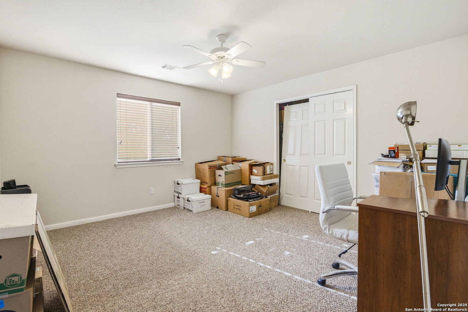133 Falling Sun Cibolo, TX 78108 - Photo 22 of 28 a living room with furniture and a chandelier