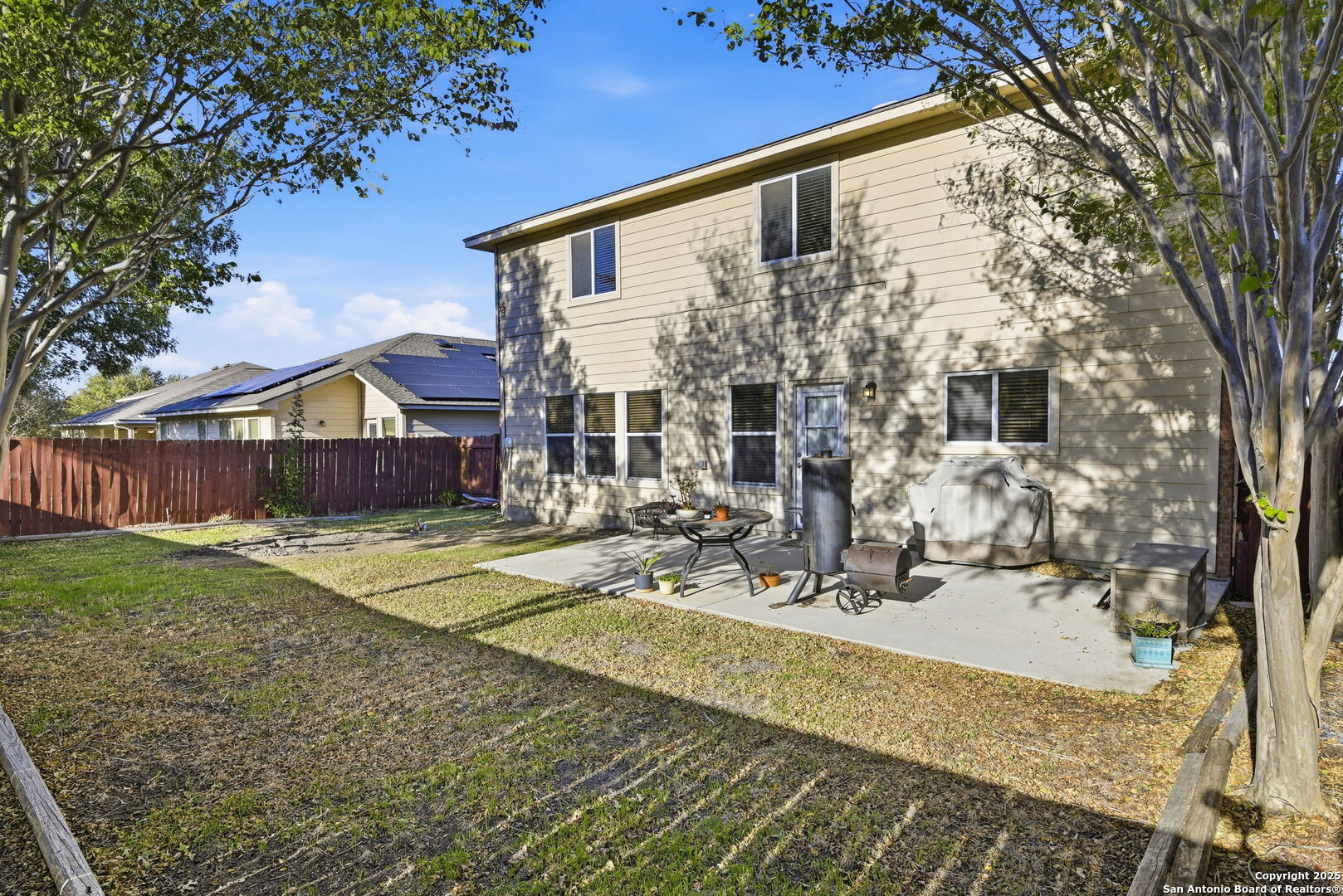 133 Falling Sun Cibolo, TX 78108 - Photo 25 of 28 a view of a house with backyard and sitting area
