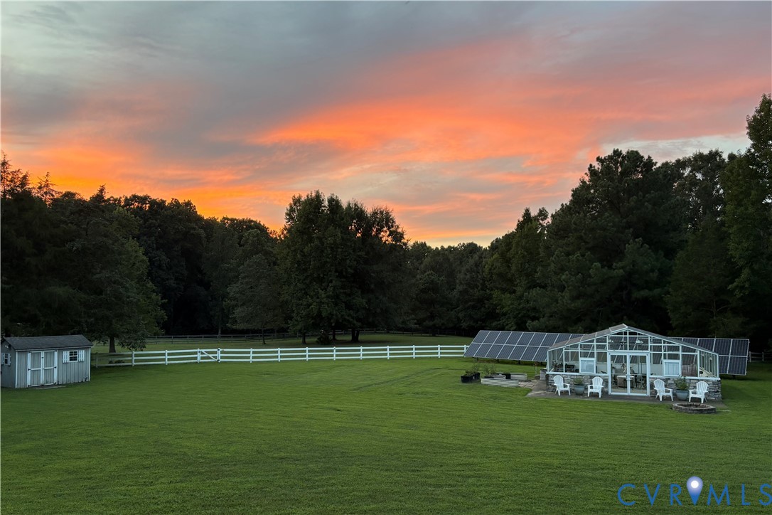 2365 State Rte 635 Midlothian, VA 23113 - Photo 50 of 64 Expansive grassy area with a white fence, a greenh