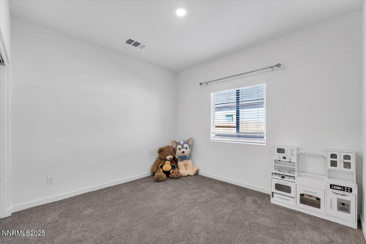 7523 Grassy Plains Drive Reno, NV 89506 - Photo 17 of 22 a children room with a window
